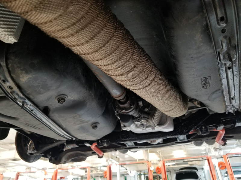 A wrapped exhaust keeps the rear fuel tank cool. Photo via Johnny Youssef/C30 Crew; used with permission.